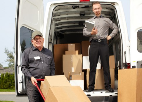 Removal van and moving boxes prepared for a flat move in Notting Hill