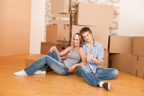 Moving team handling furniture removals on a Notting Hill residential street