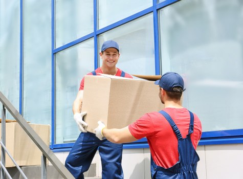 Movers protecting furniture during a safe home removal