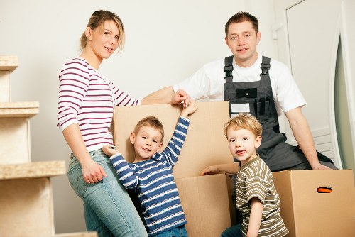 Moving team handling household items during a relocation service
