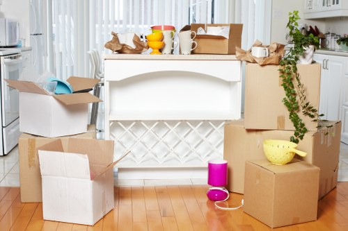 Packers assessing cubic-yard volume for a Notting Hill household move