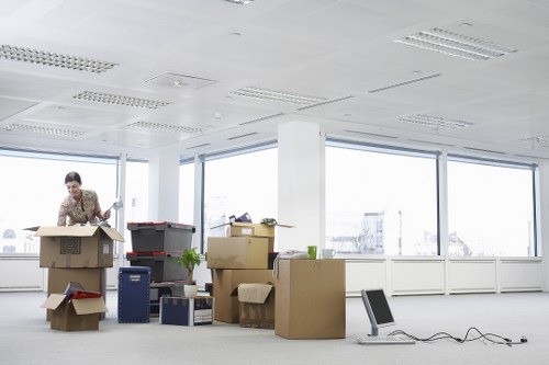 Moving team coordinating a commercial relocation in a Notting Hill street