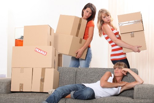 Packed boxes and furniture ready for urgent removal in West London